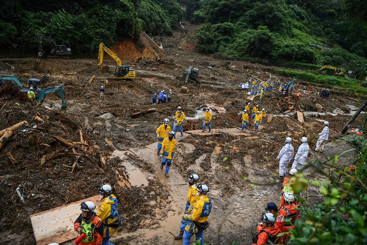 Rescue workers search for missing people in Fukuhama, Kumamoto prefecture on July 11, 2020, after heavy rains and flooding devastated the region. Credits: AFP Photo