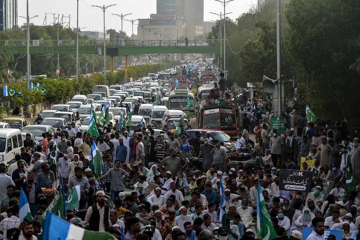 Activists of Islmamic political party 'Jamaat-e-Islami Pakistan' protest against electricity shortage as they block a road in Karachi. Credits: AFP Photo