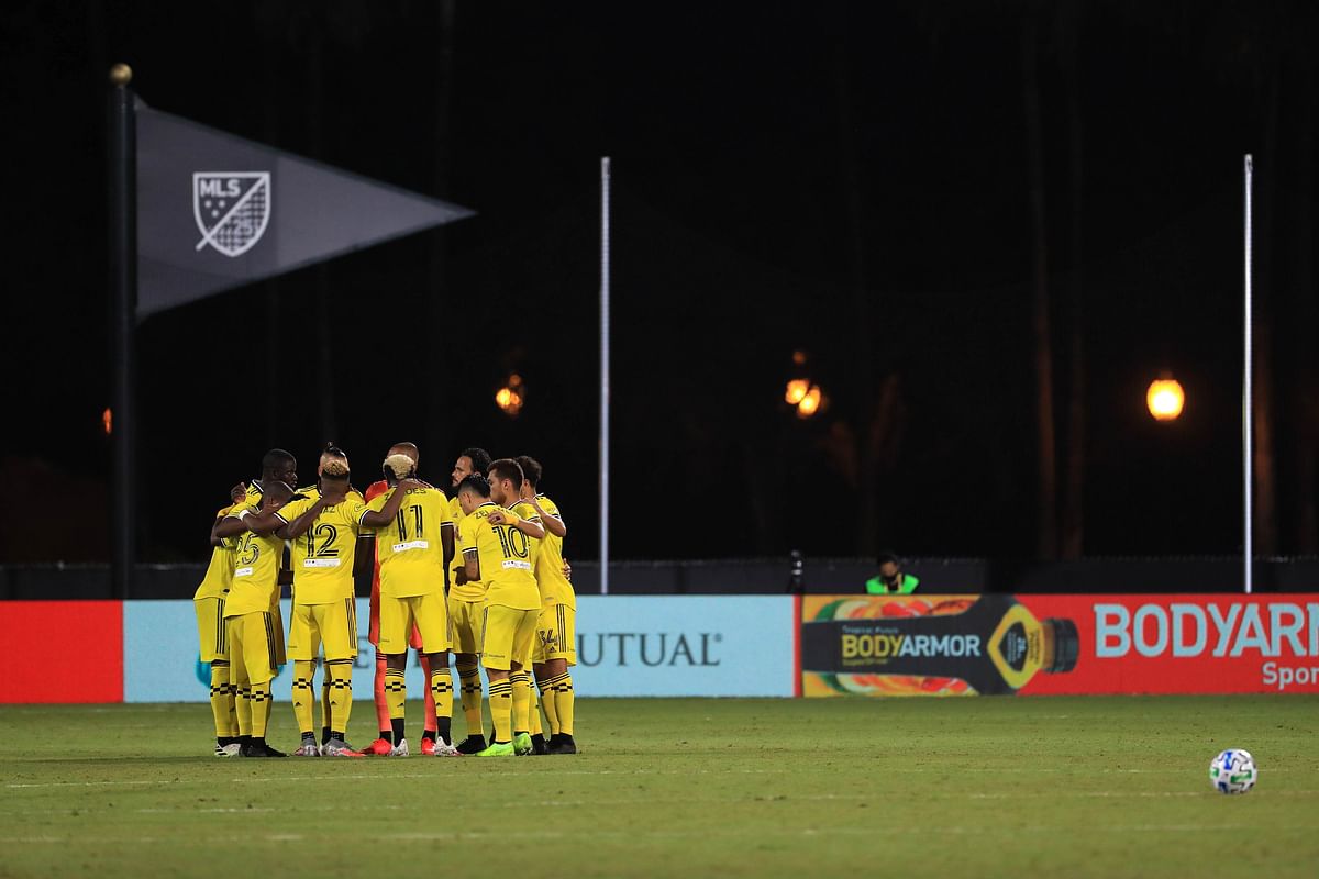 The Columbus Crew huddle up prior to the match against the FC Cincinnati in the MLS Is Back Tournament at ESPN Wide World of Sports Complex. Credits: AFP Photo