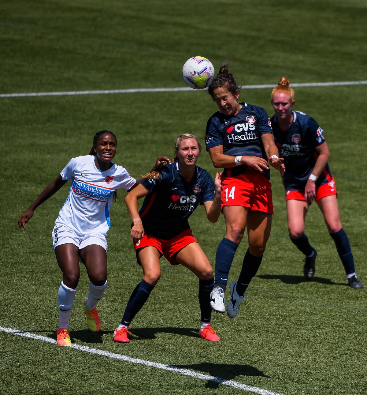 Paige Nielsen #14 of Washington Spirit attempts a header during a game against the Houston Dash on day 7 of the NWSL Challenge Cup at Zions Bank Stadium on July 12, 2020 in Herriman, Utah. Credit: Getty Images/AFP