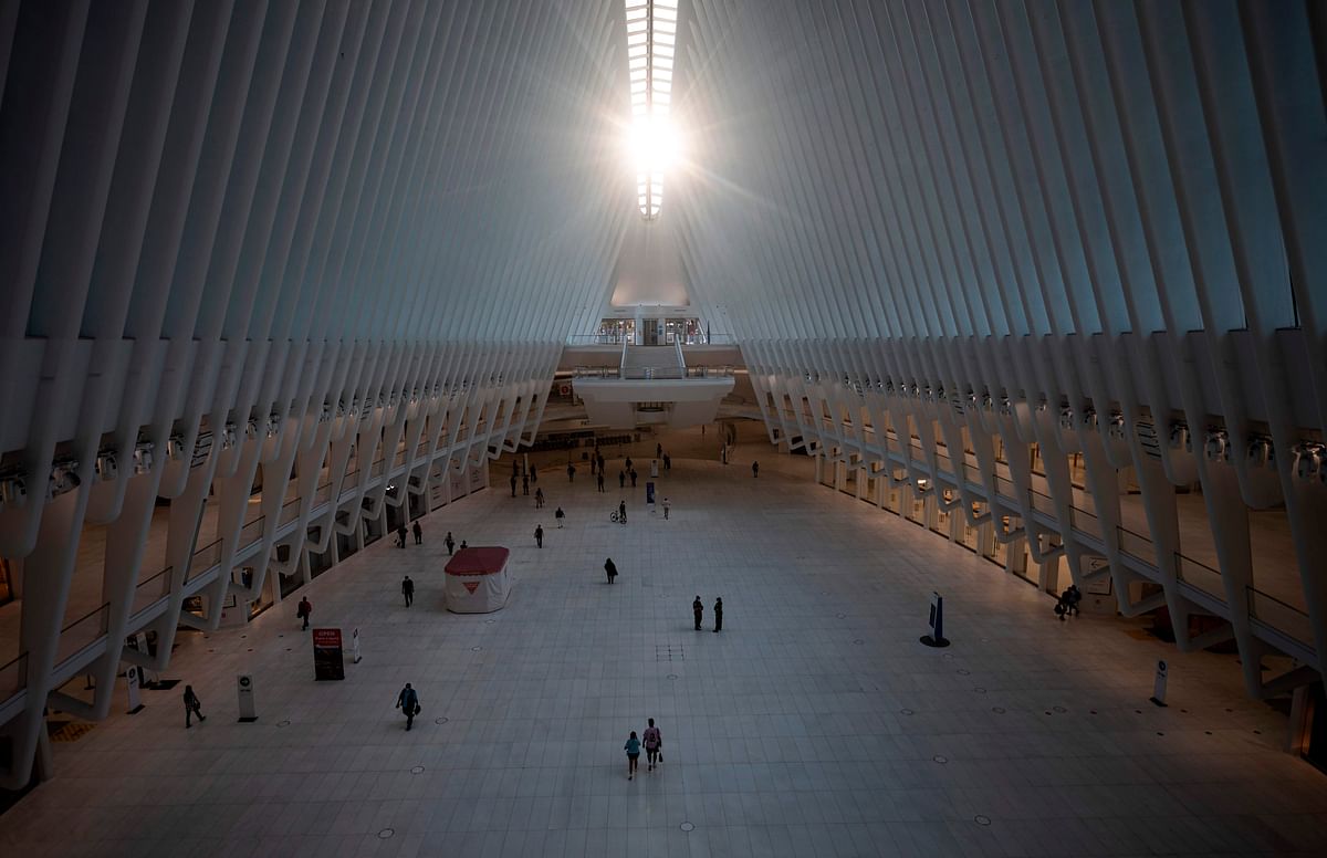The sun shines through the roof of the glass and steel structure called the Oculus which serves as the World Trade Center Station, a transportation hub in the heart of the 9-11 Ground Zero, in New York City, amid the coronavirus pandemic on July 13, 2020 in New York City. Credit: AFP