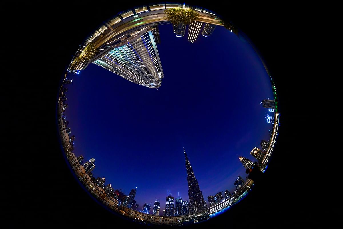 A picture taken with a fish-eye lens on July 19, 2020 shows Dubai's Burj Khalifa, the tallest structure and building in the world since 2009 (total heigh with antenna of 829.8 metres), ahead of the expected launch of the United Arab Emirates