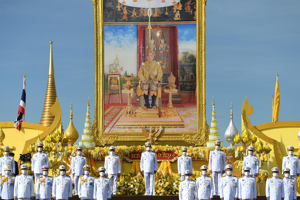 Thailand's Prime Minister Prayuth Chan-ocha and cabinet members pay respect to a picture of Thai King Maha Vajiralongkorn during a celebration to mark the king's 68th birthday in Bangkok, Thailand, July 28, 2020. Credit: Reuters Photo