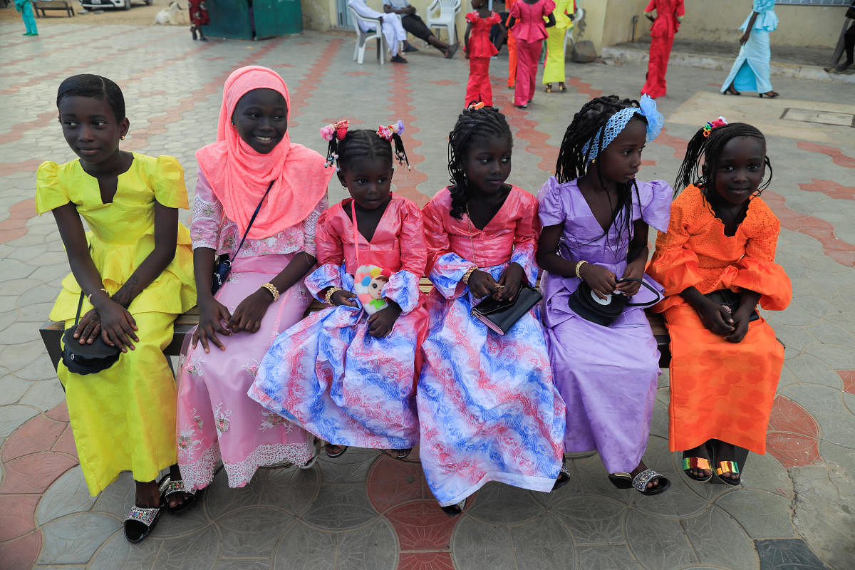Girls wearing new clothes are pictured during the celebration of the first day of Eid al-Adha in Dakar, Senegal. Credit: Reuters