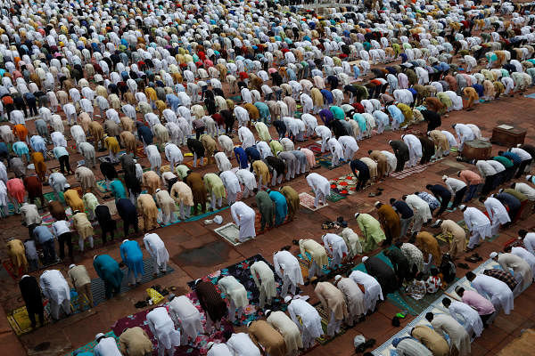 Muslims offer Eid al-Adha prayers at the Jama Masjid (Grand Mosque) during the outbreak of the coronavirus, in the old quarters of Delhi. Credit: Reuters