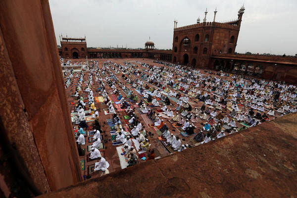 Muslims attend Eid al-Adha prayers at the Jama Masjid. Credit: Reuters