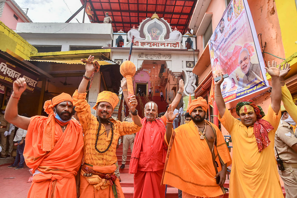 Sadhus celebrate the Bhoomi Pujan day for the construction of Ram Temple, at Hanuman Garhi. Credit: PTI