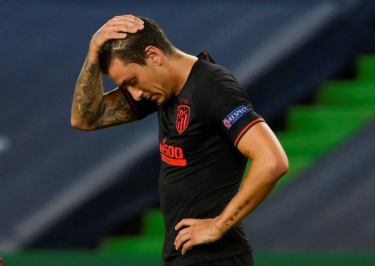 Atletico Madrid's Jose Gimenez looks dejected after the match, as play resumes behind closed doors following the outbreak of the coronavirus disease. Credit: Reuters