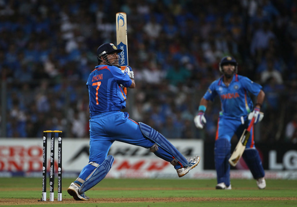 Mahendra Singh Dhoni of India hits a six during the 2011 ICC World Cup Final between India and Sri Lanka at the Wankhede Stadium on April 2, 2011 in Mumbai, India. Credit: Getty Images