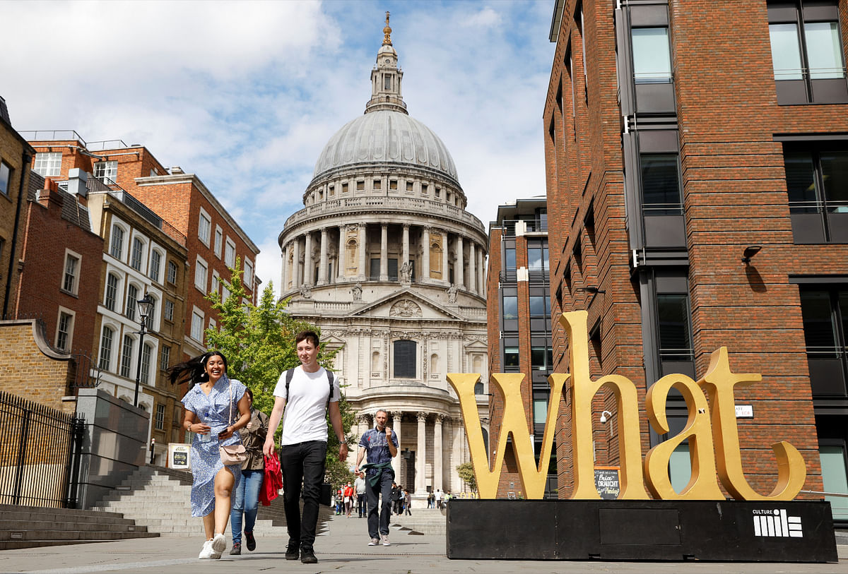 People walk near St Paul's Cathedral, amid the outbreak of the coronavirus disease (COVID-19), in London, Britain. Credit: Reuters Photo