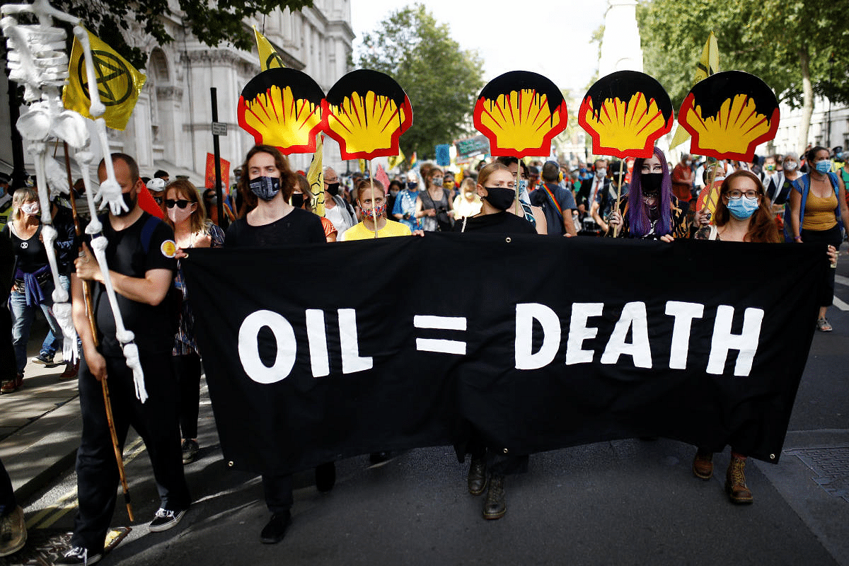 Activists take part in an Extinction Rebellion protest in Westminster, London, Britain . Credit: Reuters Photo