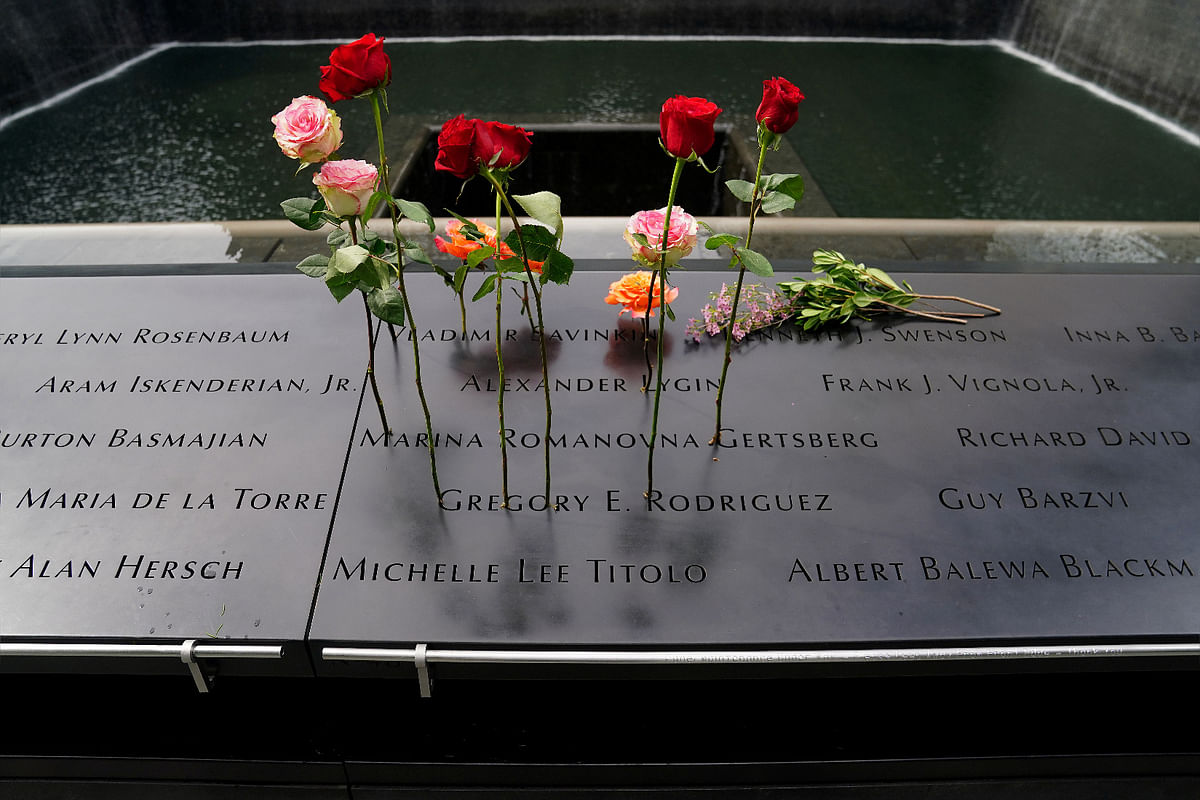 Flowers sit in names at the north reflecting pool at the National 9/11 Memorial the day before the 19th anniversary of attacks in the Manhattan borough of New York City. Credit: Reuters Photo