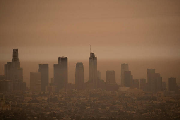 The downtown skyline is pictured amidst the smoke from the Bobcat fire in Los Angeles, California, US. Credit: Reuters Photo