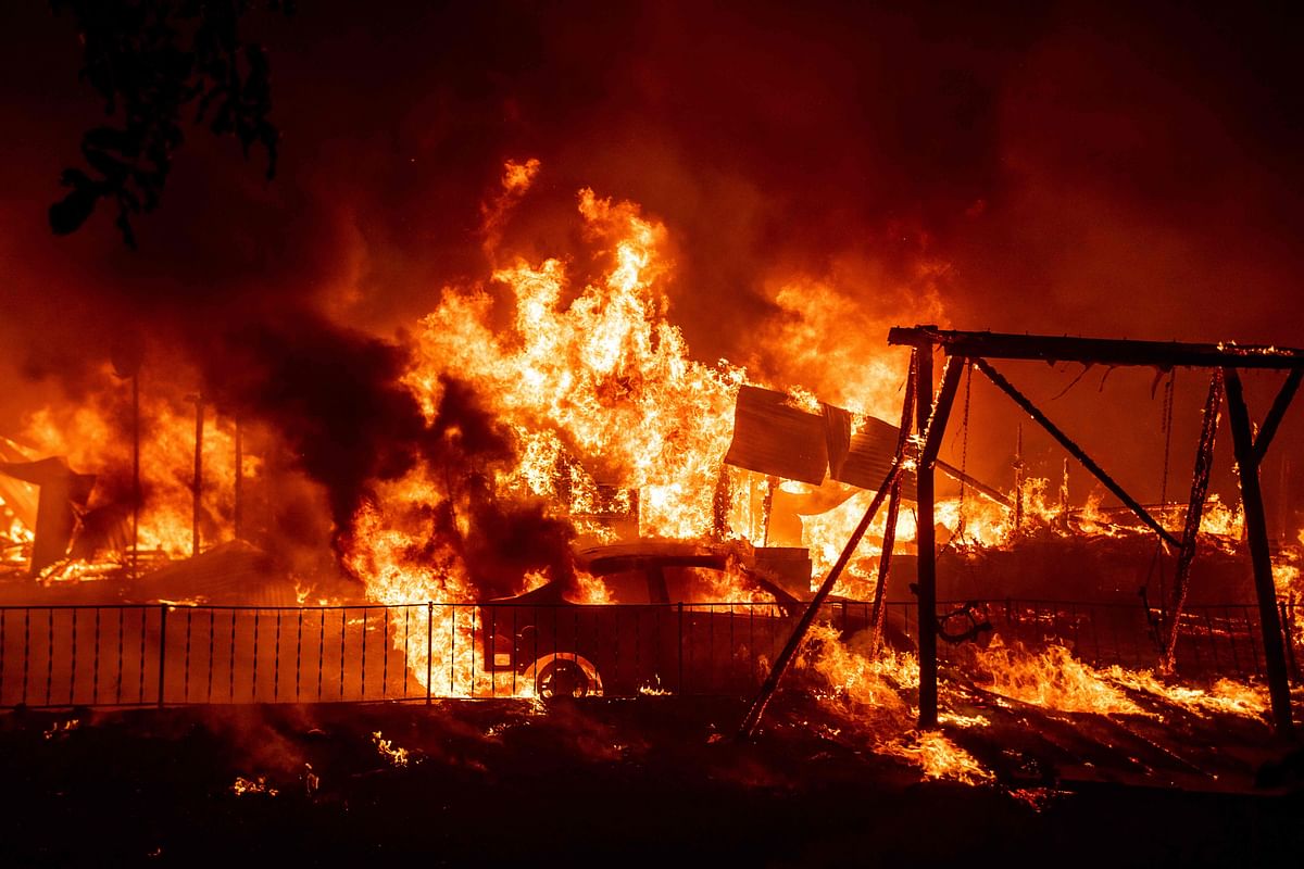 A home burns during the Bear fire, part of the North Lightning Complex fires in the Berry Creek area of unincorporated Butte County, on September 9, 2020. Credit: AFP Photo