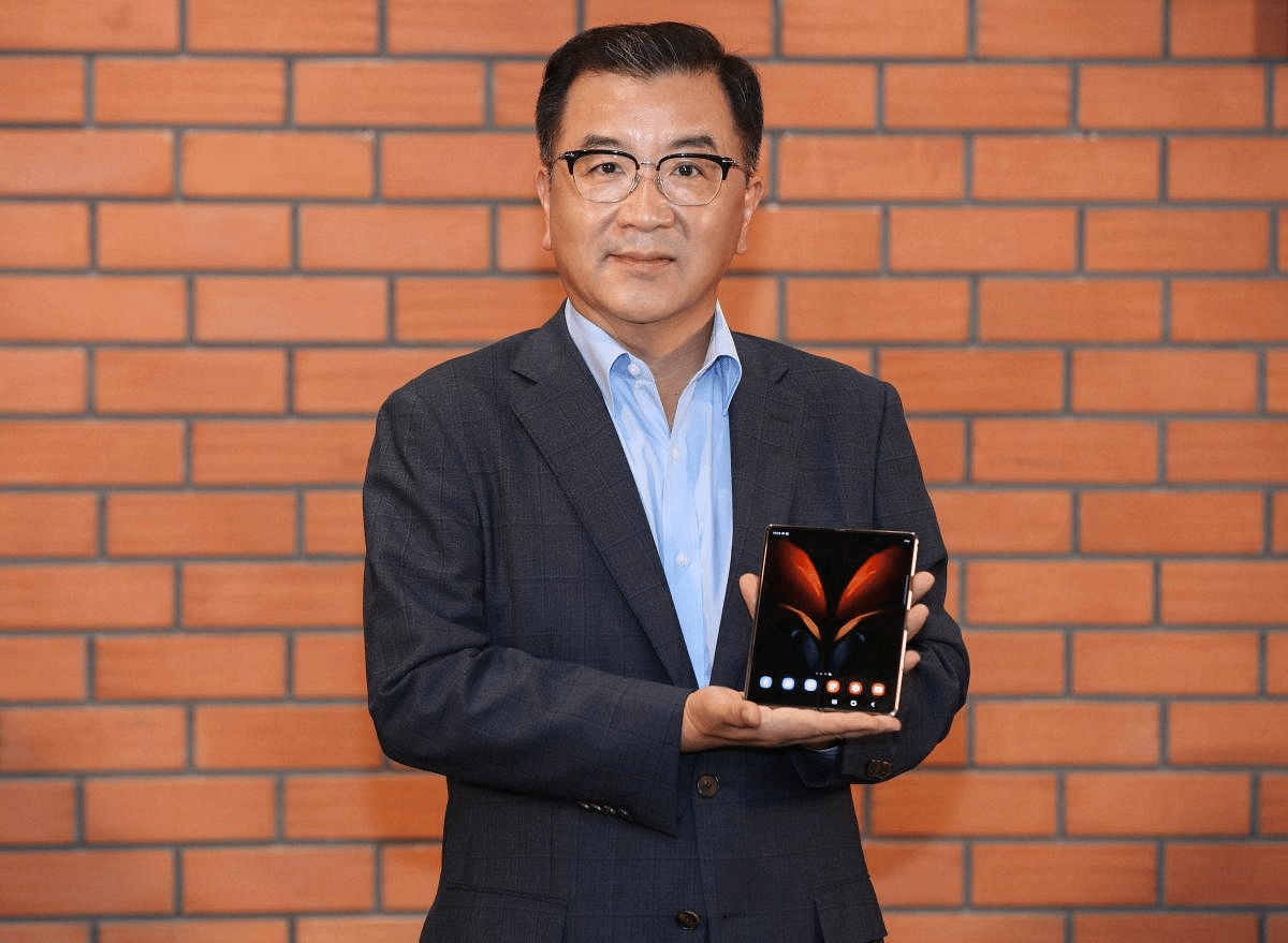 Samsung SWA President and CEO Ken Kang unveils Galaxy Z Fold 2 5G, priced at Rs 1,49,999 per unit. Samsung will start pre-booking of the premium handsets from September 14. Credit: PTI Photo
