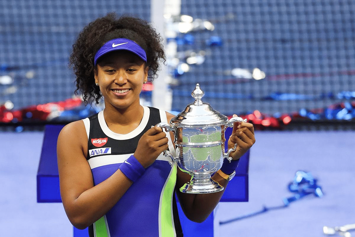 Naomi Osaka of Japan celebrates with the trophy after winning her Women's Singles final match against Victoria Azarenka of Belarus on Day Thirteen of the 2020 US Open at the USTA Billie Jean King National Tennis Center. Credit: AFP Photo
