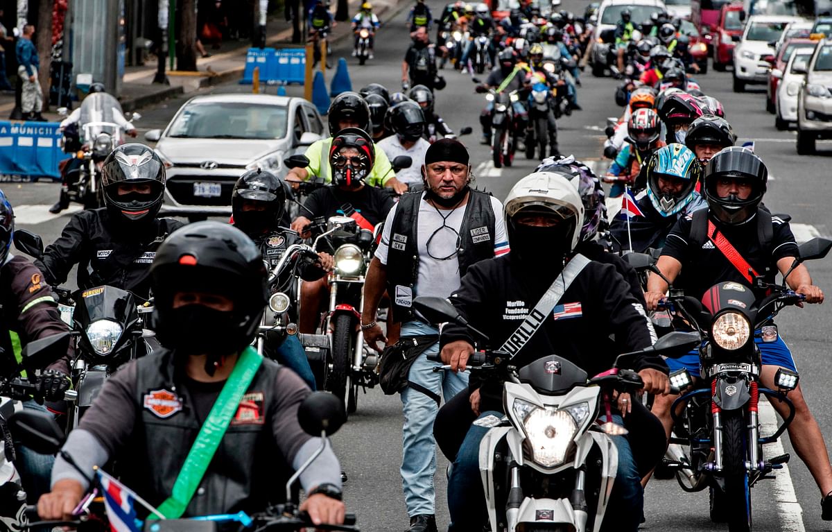 Motorcyclists take part in a demonstration against the collection of the Rights of Circulation tax in San Jose, Costa Rica. Credit: AFP
