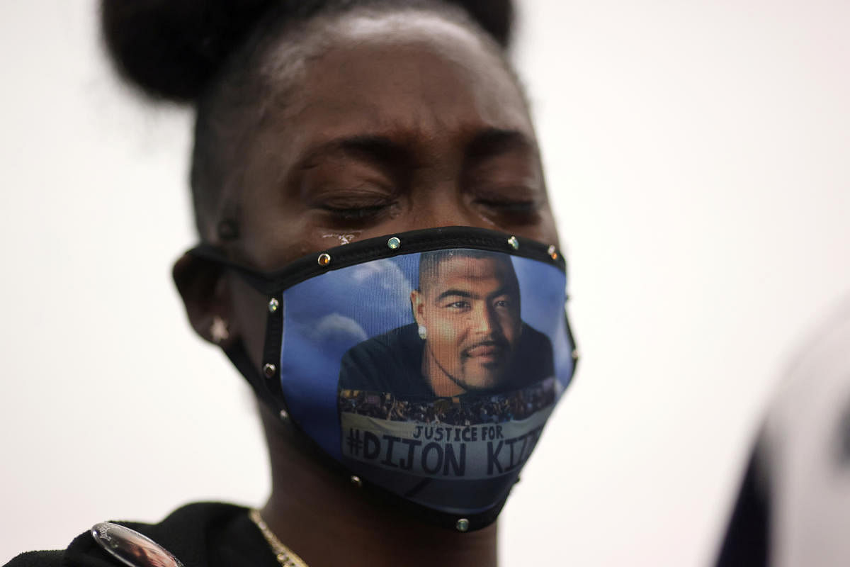 Shaneika Hall, cousin of Dijon Kizzee, who was killed by Los Angeles sheriff’s deputies, listens at a press conference to announce the results of an independent investigation in the Kizzee case in Los Angeles, California. Credit: Reuters Photo