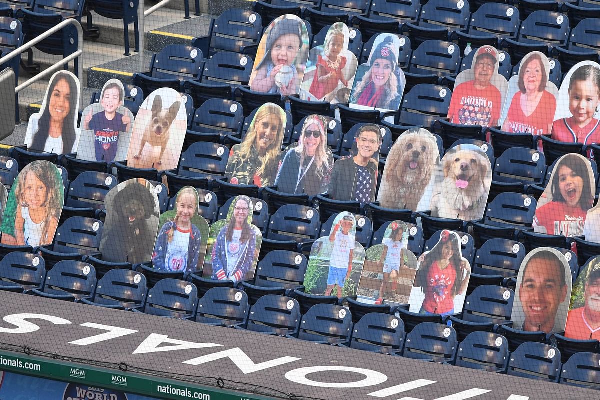 Cardboard cut outs of fans in the stands during a baseball game between the Washington Nationals andthe Philadelphia Phillies at Nationals Park on September 23, 2020 in Washington, DC. Credit: AFP