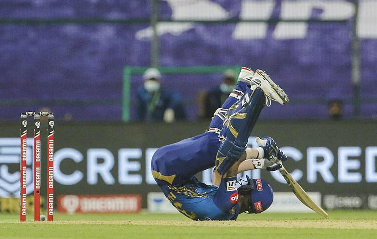 Mumbai Indians batsman Hardik Pandya falls on the ground during IPL 2020 cricket match against Kolkata Knight Riders. Credit: PTI
