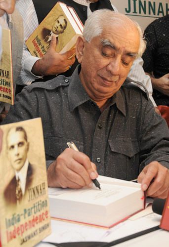 Former Union Minister Jaswant Singh signing his book, Jinnah: India-Partition Independence book, at the book launch programme in Bengaluru. Credit: DH Archive