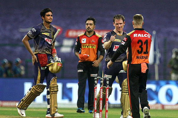 Shubman Gill and Eoin Morgan of Kolkata Knight Riders being greeted by Sunrisers Hyderabad players after their win in Indian Premier League 2020 cricket match at the Sheikh Zayed Stadium, Abu Dhabi. Credit: PTI Photo