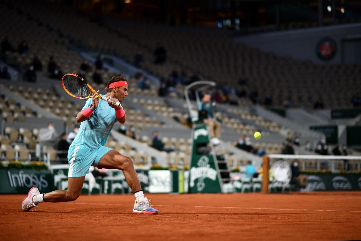 Spain's Rafael Nadal returns the ball to Belarus' Egor Gerasimov during their men's singles first round tennis match at the Philippe Chatrier court on Day 2 of The Roland Garros 2020 French Open tennis tournament in Paris. Credit: AFP Photo