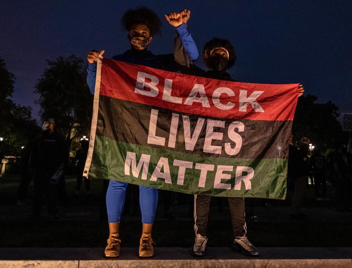 Black Lives Matter protesters gather in Wade Park to protest for Black lives and against US President Donald Trump ahead of the first presidential debate in Cleveland, Ohio. The debate, hosted by Case Western Reserve University and the Cleveland Clinic, will be moderated by Fox News anchor Chris Wallace. Credit: AFP Photo