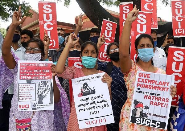 Members of Socialist Unity Centre of India (SUCI) stage a protest in Bengaluru. Credit: PTI Photo