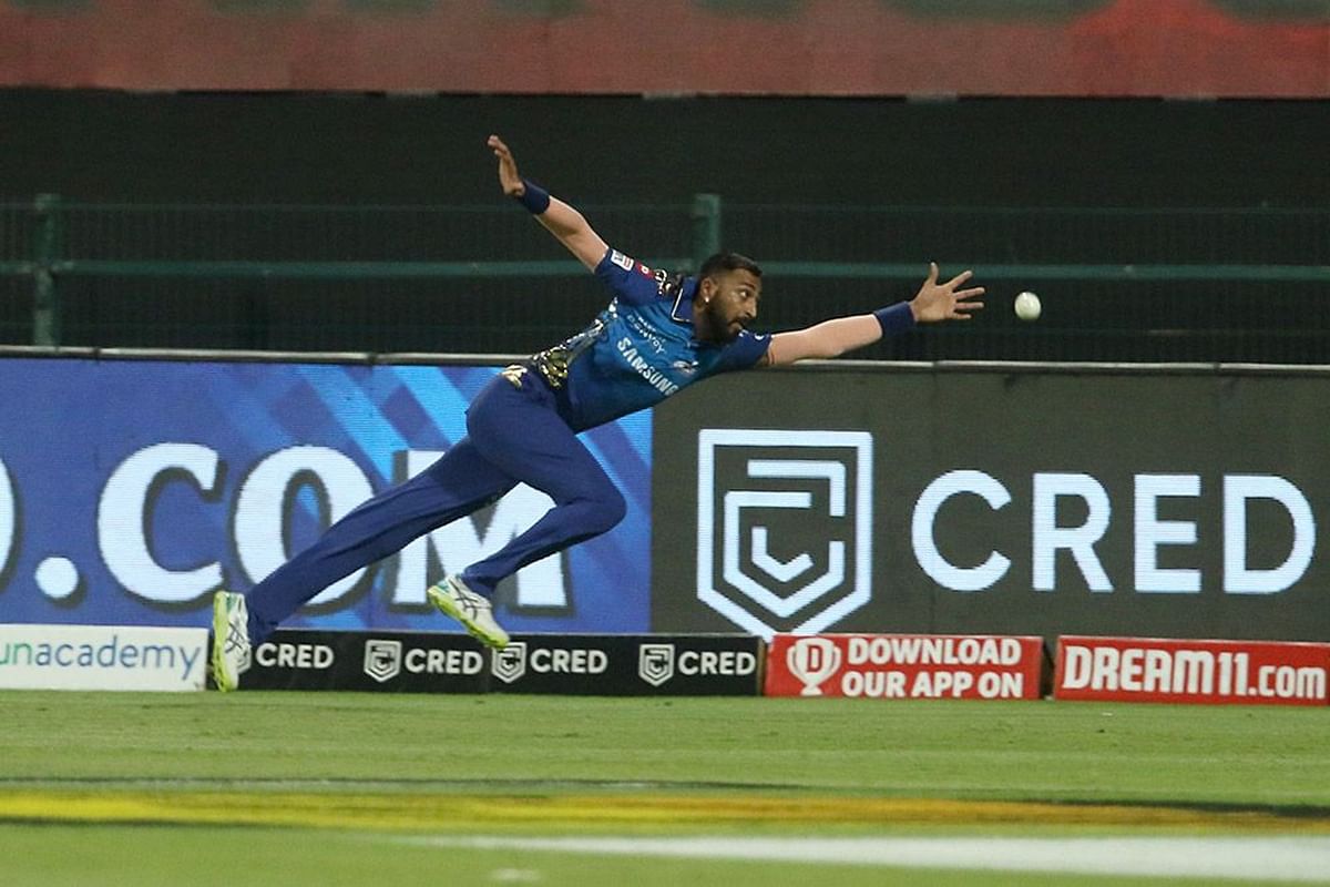 Krunal Pandya of Mumbai Indians dives to save a four by Kings XI Punjab. Credit: iplt20.com, BCCI