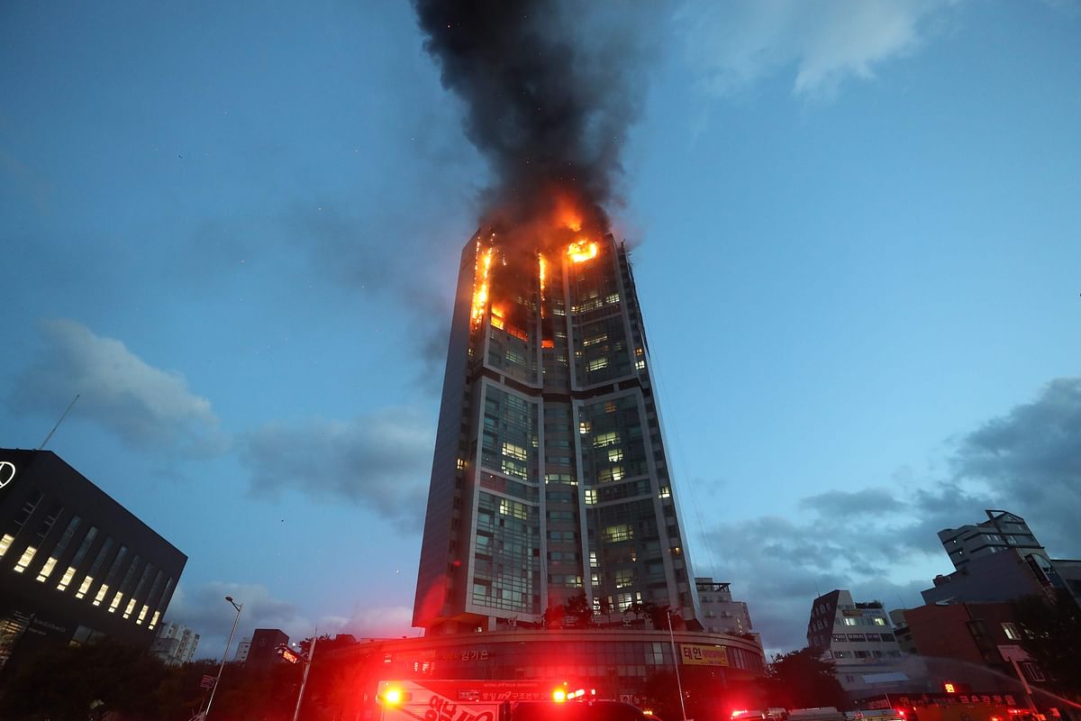 Flames and smoke rise from a fire at an apartment building in Ulsan on October 9, 2020. Credit: AFP Photo