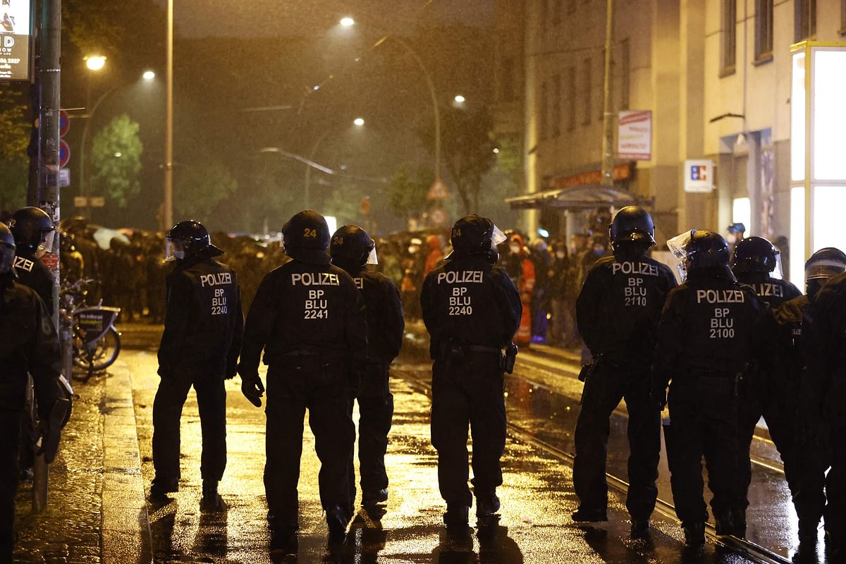 Police secures the area around Monbijou Park in Berlin Mitte district as demostrators march in support for the residents of the squatted building at Liebig street 34 in Berlin whom have been evicted. Credit: AFP Photo