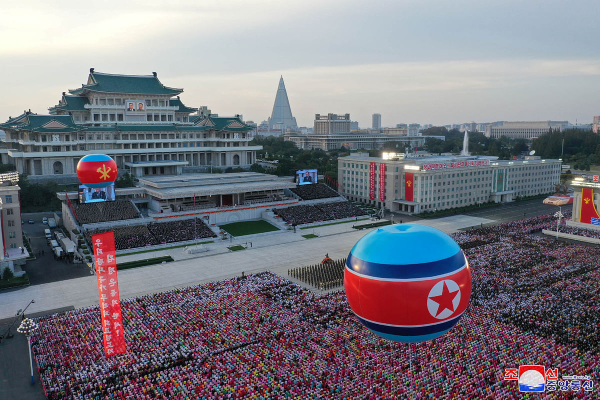 People gather to commemorate the 75th anniversary of the founding of the ruling Workers' Party of Korea (WPK), at Kim Il Sung Square, Pyongyang, North Korea. Credit: Reuters Photo