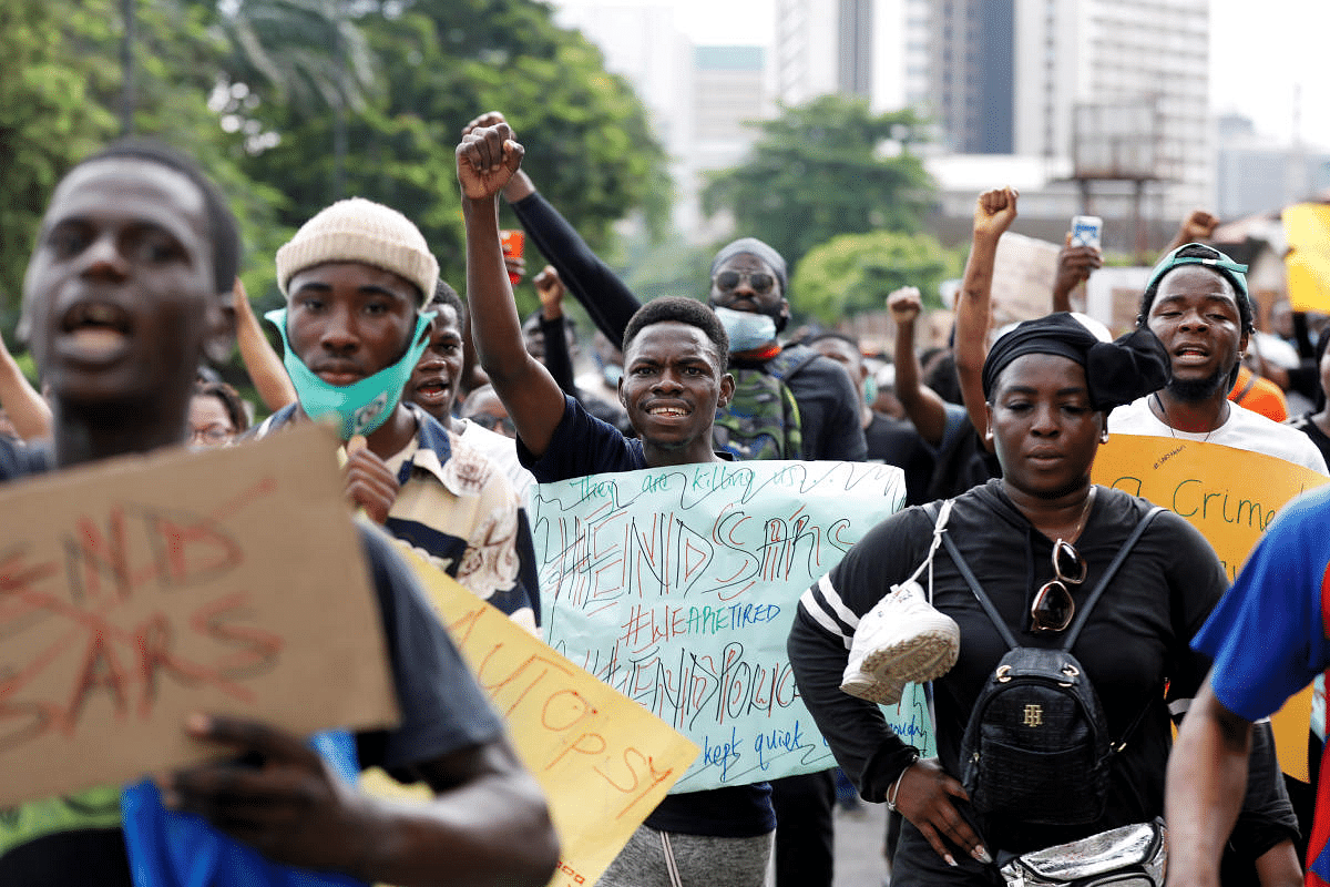 Nigerians take part in a protest against alleged violence, extortion and harassment from Nigeria's Special Anti-Robbery Squad (SARS), in Lagos, Nigeria. Credit: Reuters Photo