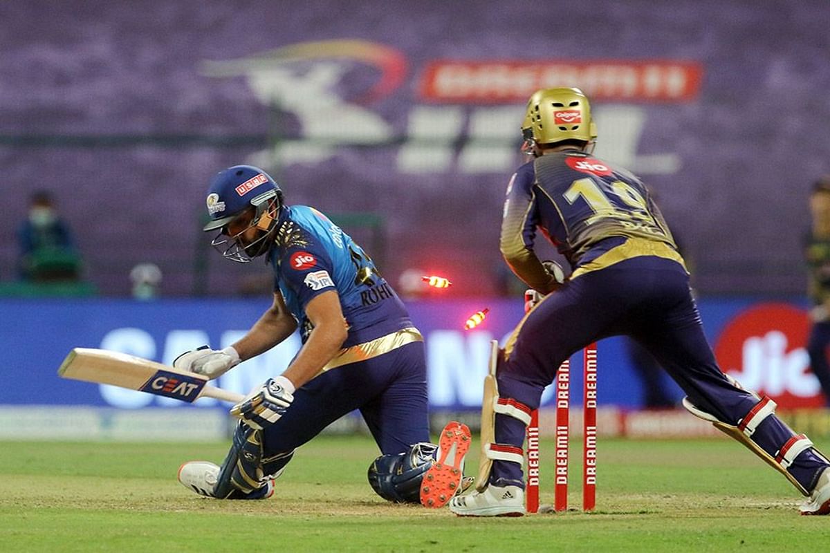 Dinesh Karthik of Kolkata Knight Riders tries to stump Rohit Sharma captain of Mumbai Indians during the match. Credit: iplt20.com/BCCI