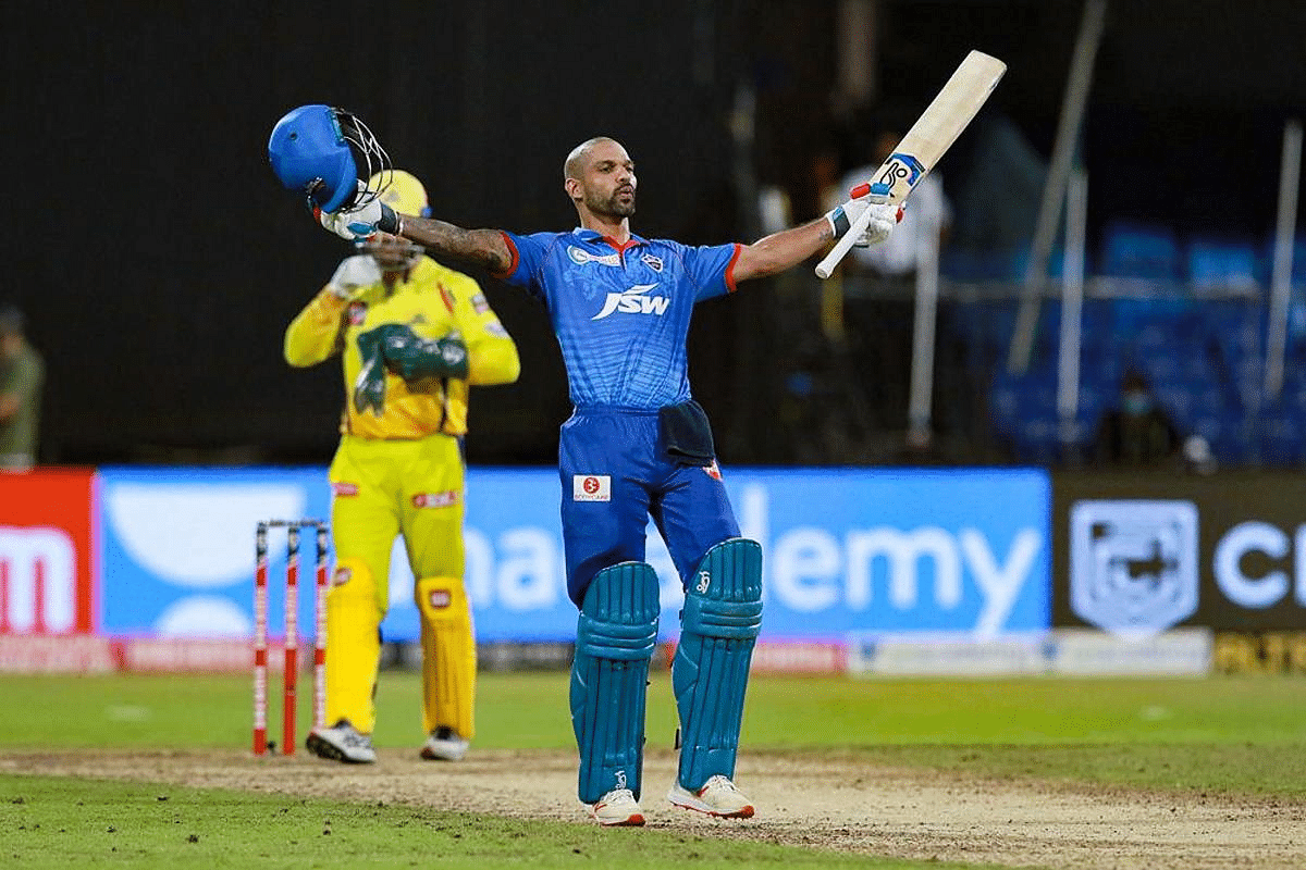 Delhi Capitals (DC) player Shikhar Dhawan celebrates after scoring a century during their Indian Premier League (IPL) T20 cricket match against Chennai Super Kings (CSK), at the Sharjah Cricket Stadium in Sharjah. Credit: PTI Photo