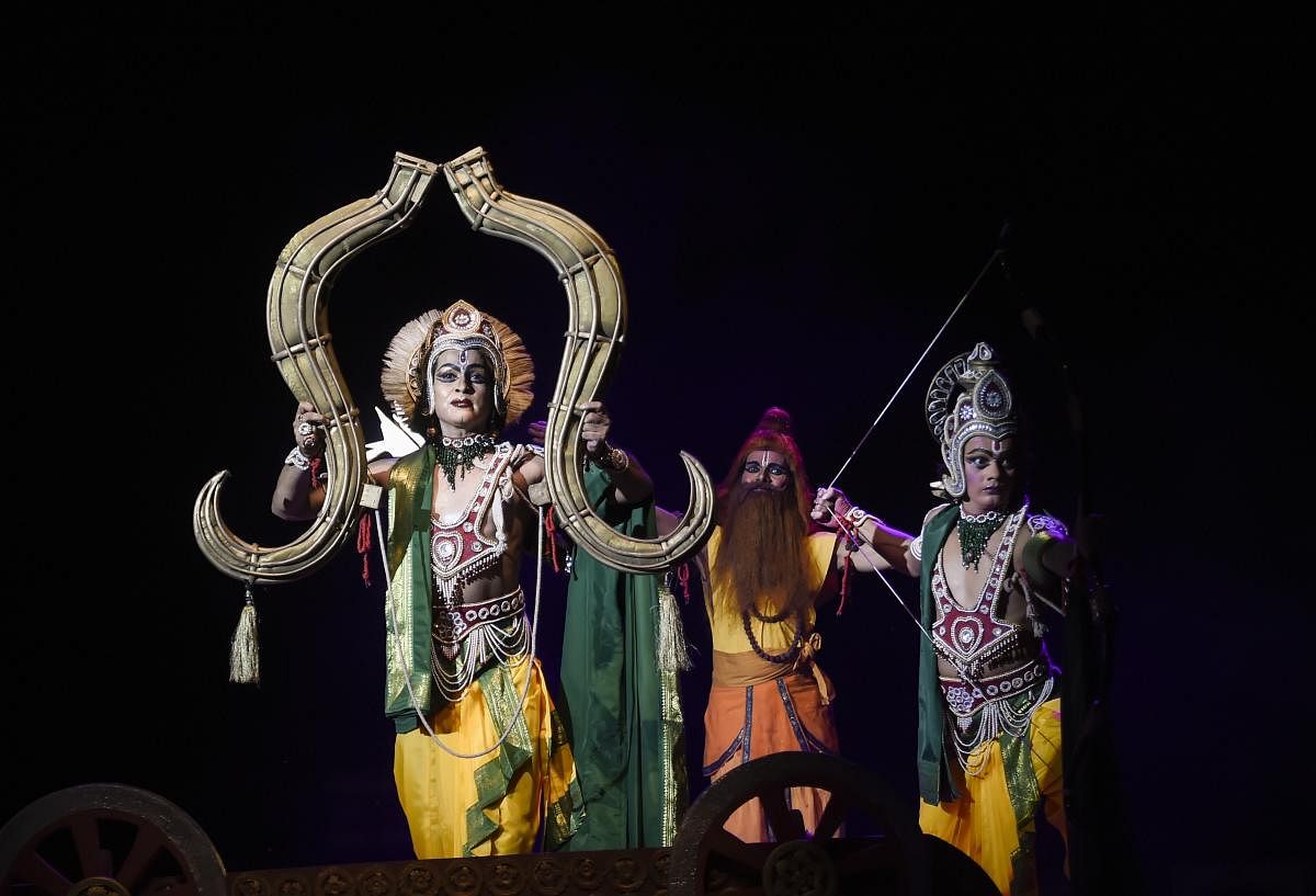 Artists perform Ramlila, a dramatic re-enactment of the life of Lord Ram, on the first day of Navratri festival, in New Delhi. Credit: PTI Photo