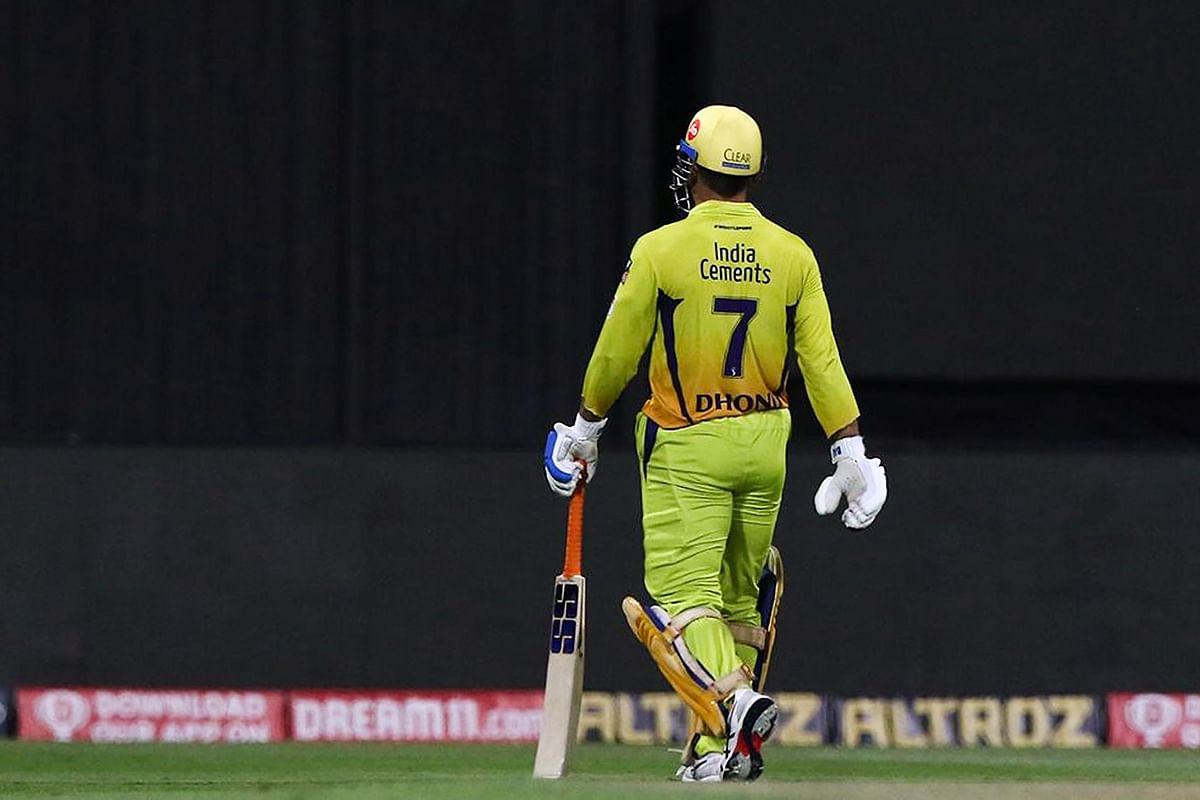 Chennai Super Kings captain MS Dhoni walks back to the pavilion after getting dismissed. Credit: PTI Photo