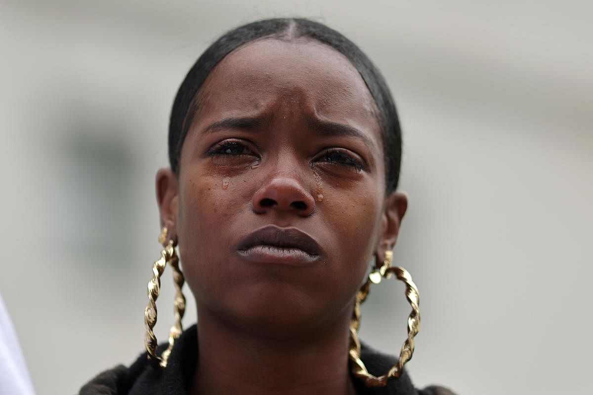 Stephanie Goulsby, 21, whose boyfriend Fred Williams Jr was shot by sheriff's deputies, listens to a news conference outside Sherif's Department headquarters, in Los Angeles. Credit: Reuters Photo
