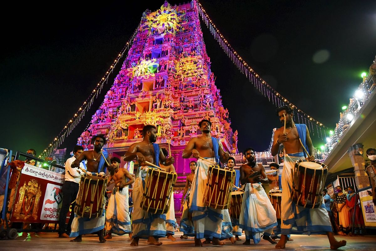 Musicians from Kerala play tradional drums during 'Durga Puja' procession during the Navratri festival, Kanaka Durga temple, in Vijayawada. Credit: PTI Photo