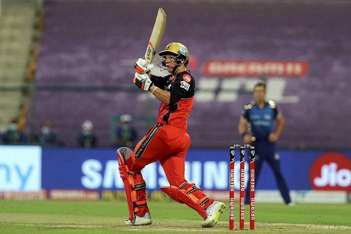 Joshua Philippe of the Royal Challengers Bangalore plays a shot during Indian Premier League (IPL) match between the Mumbai Indians and the Royal Challengers Bangalore, at the Sheikh Zayed Stadium in Abu Dhabi. Credit: PTI Photo