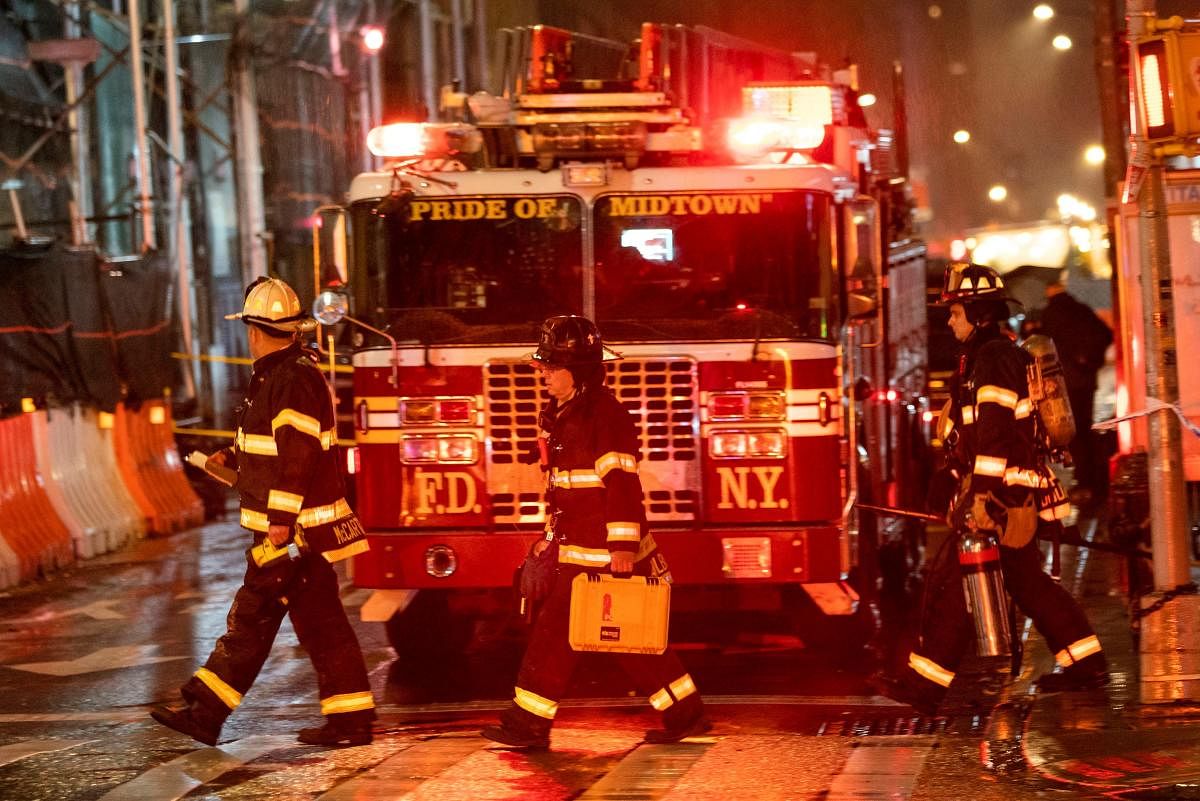 Emergency responders work at the scene of a collapsed crane in the midtown area of Manhattan, New York City. Credit: Reuters.