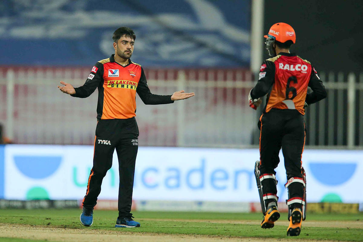 Sunrisers Hyderabad player Rashid Khan celebrates the wicket of Royal Challengers Bangalore batsman Joshua Philippe. Credit: PTI Photo