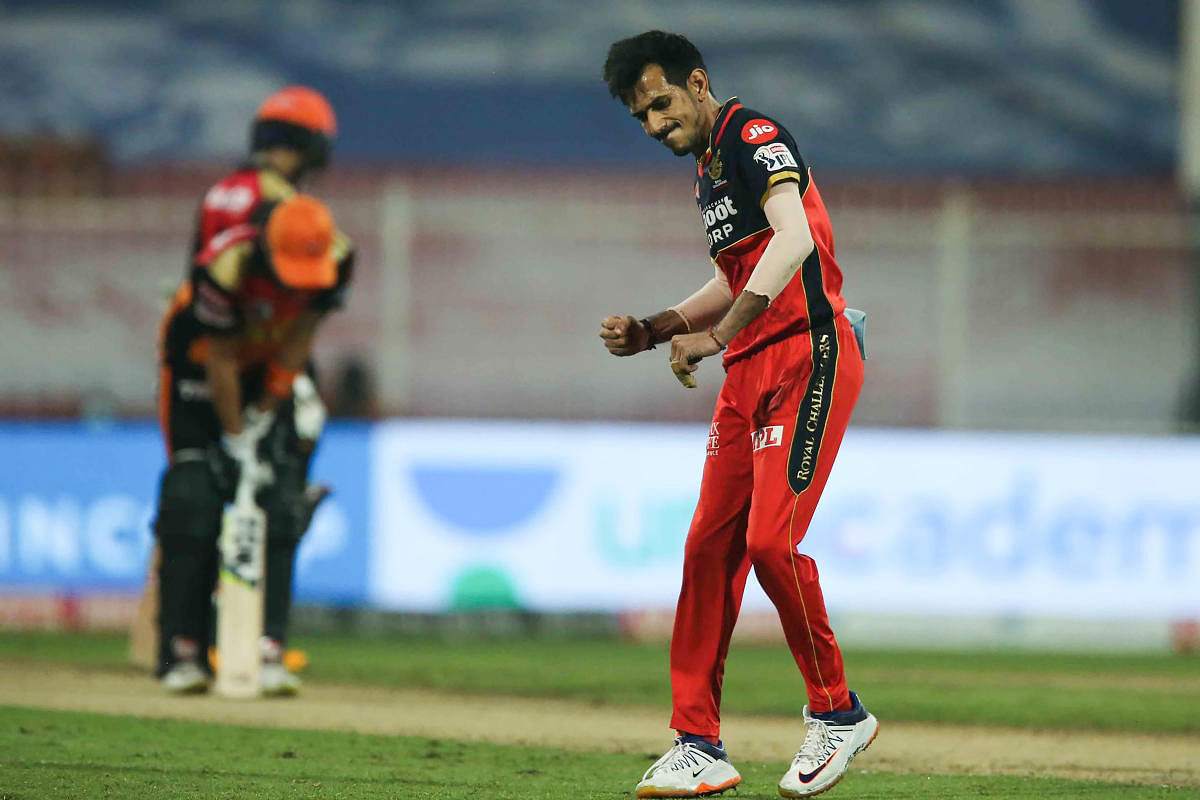 Royal Challengers Bangalore player Yuzvendra Chahal celebrates the wicket of Sunrisers Hyderabad batsman Manish Pandey. Credit: PTI Photo