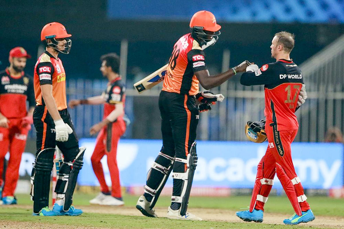 Sunrisers Hyderabad batsmen Jason Holder and Abdul Samad after winning a match against Royal Challengers Bangalore. Credit: PTI Photo