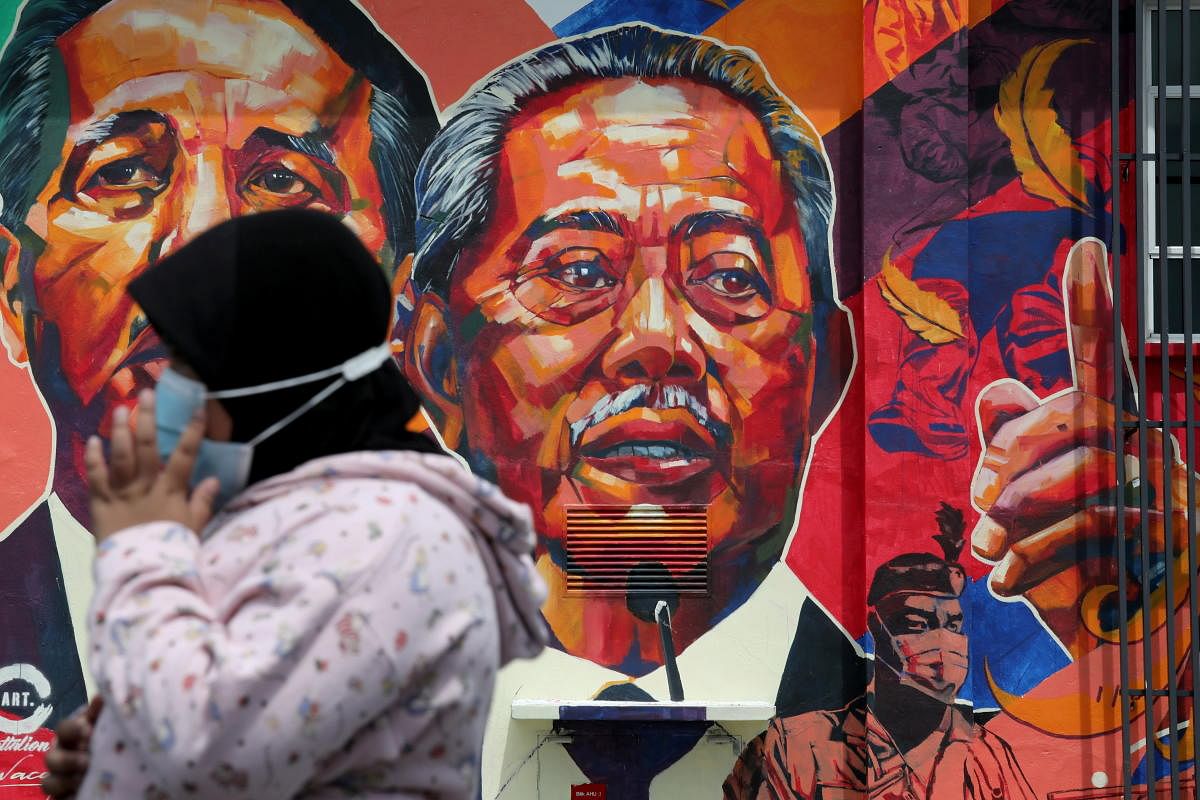 Artwork of Malaysia's Prime Minister Muhyiddin Yassin in Kuala Lumpur. About 62.1% of eligible voters in Malaysia voted in 2018 elections. Credit: Reuters Photo