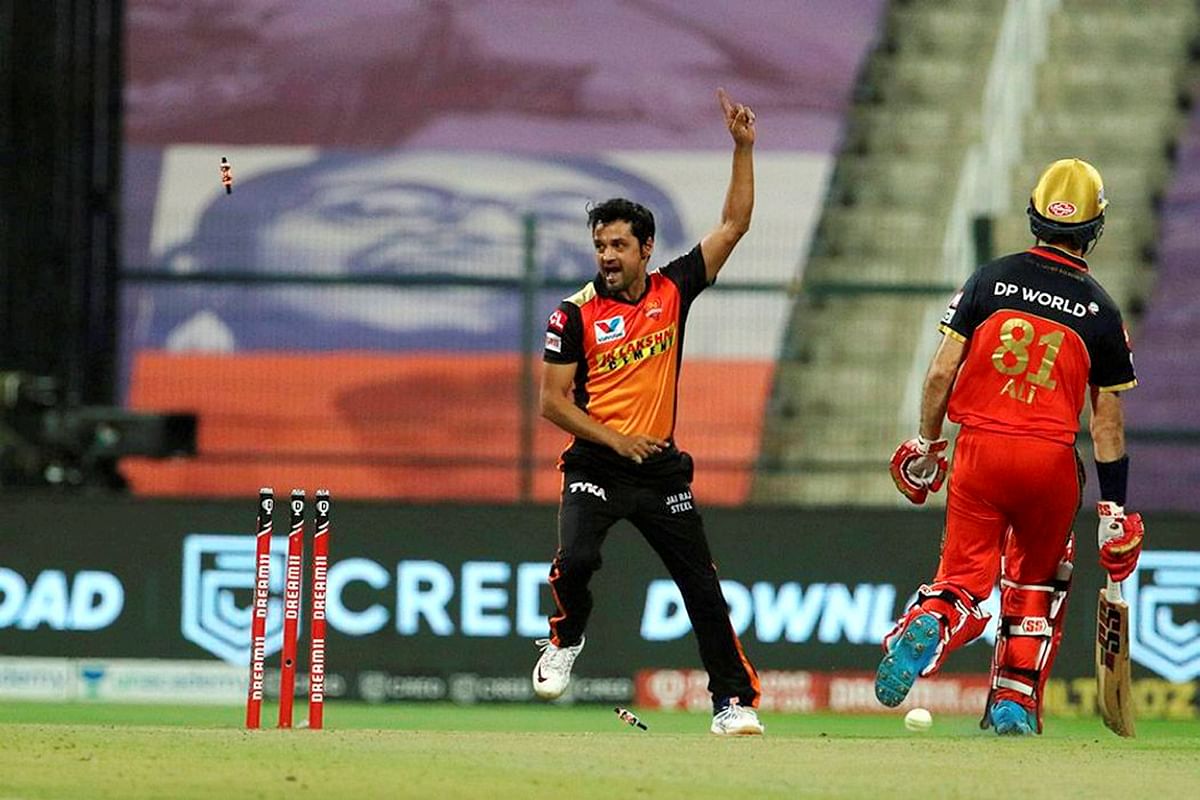 Rashid Khan of Sunrisers Hyderabad celebrates after dismissing M Ali of Royal Challengers Bangalore via run out during the eliminator match. Credit: PTI Photo