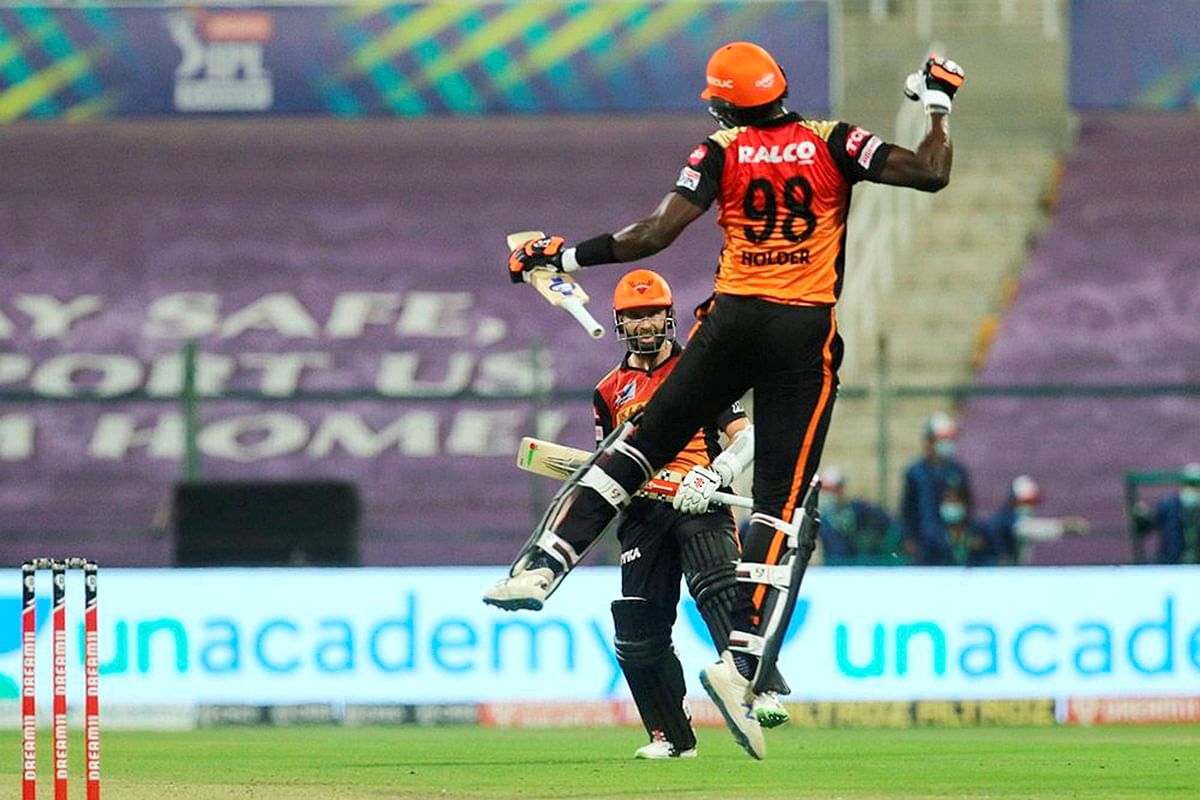 Jason Holder and Kane Williamson of Sunrisers Hyderabad celebrate their win over Royal Challengers Bangalore in the eliminator match of IPL 2020. Credit: PTI Photo