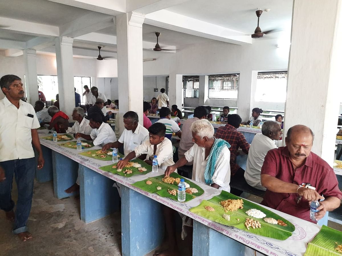 More than 200 people had their lunch at the temple premises at the mass feeding ceremony. Credit: DH Photo