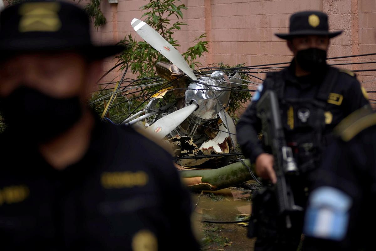 Wrecks of a plane, which was carrying humanitarian aid to an area affected by Storm Eta, are seen after crashing in Guatemala City, Guatemala. Credit: Reuters Photo
